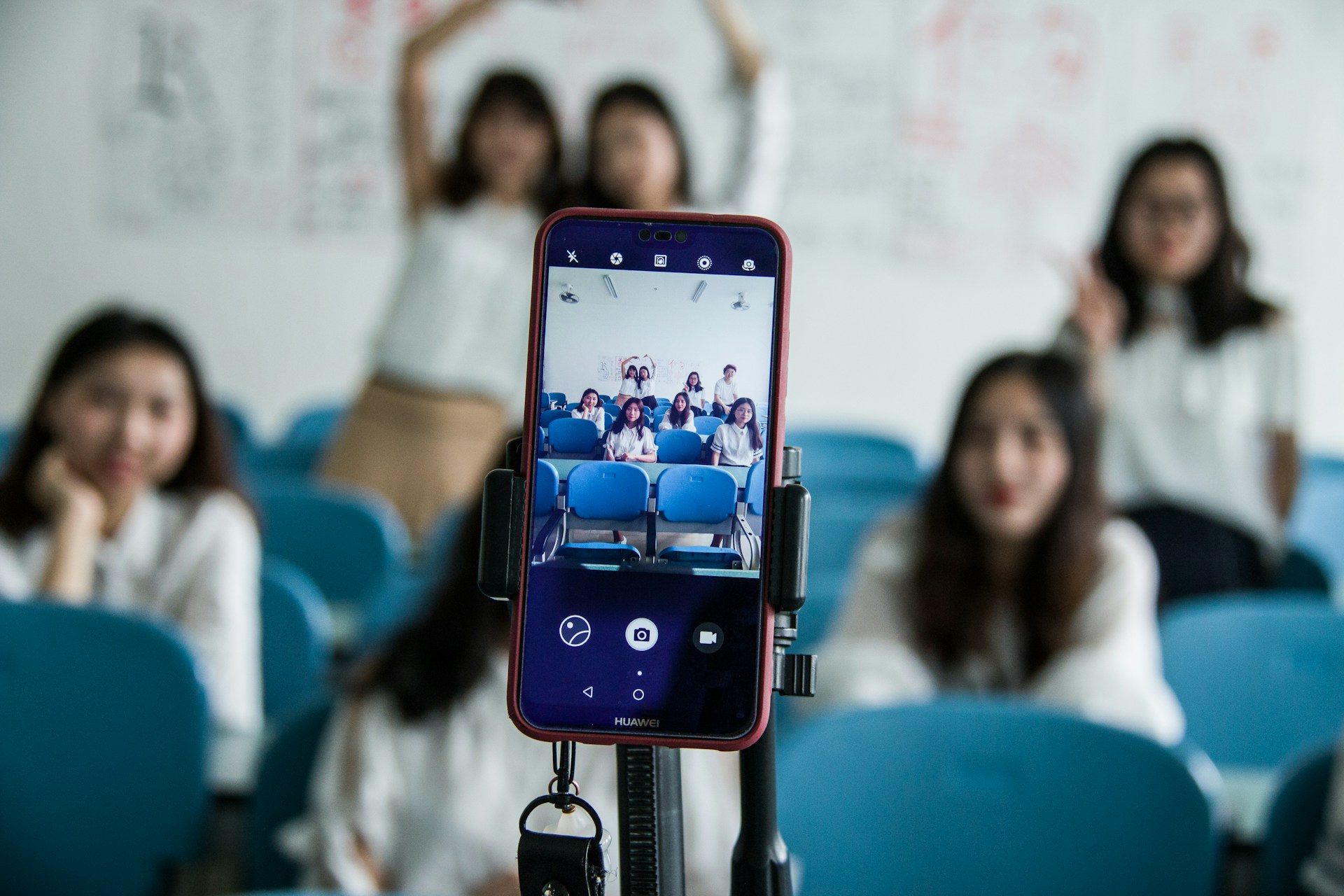 Five young women having a group picture